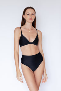 Model wearing Nero Bikini Top and Ladoga Bottom in Black by Ozero Swimwear, front view, designed in Malaysia.