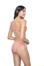 Ozero Swimwear Como minimal Bikini Set in Dusty Coral, on a model, back view, sustainable fabrics, made in Bali.